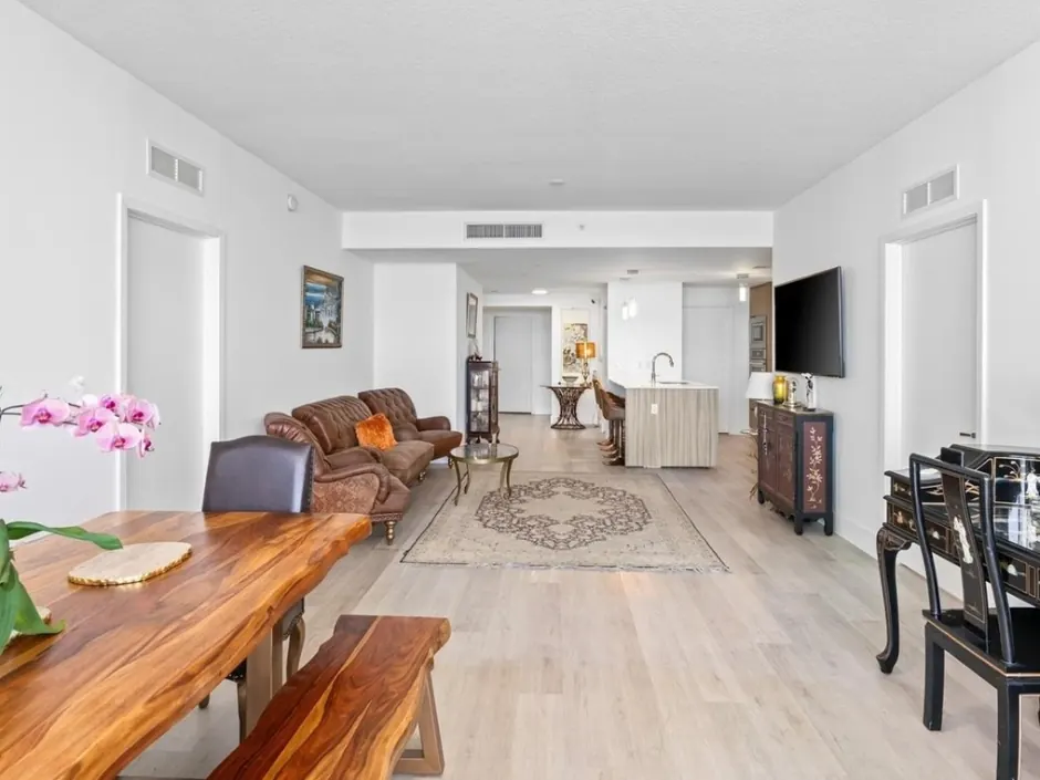 Bright condominium living and dining area after interior painting